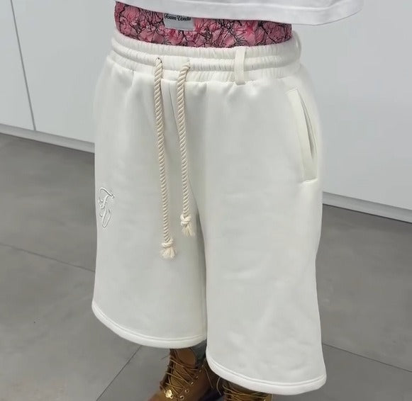 Kina - Double Waisted Camo Shorts