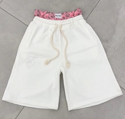 Kina - Double Waisted Camo Shorts