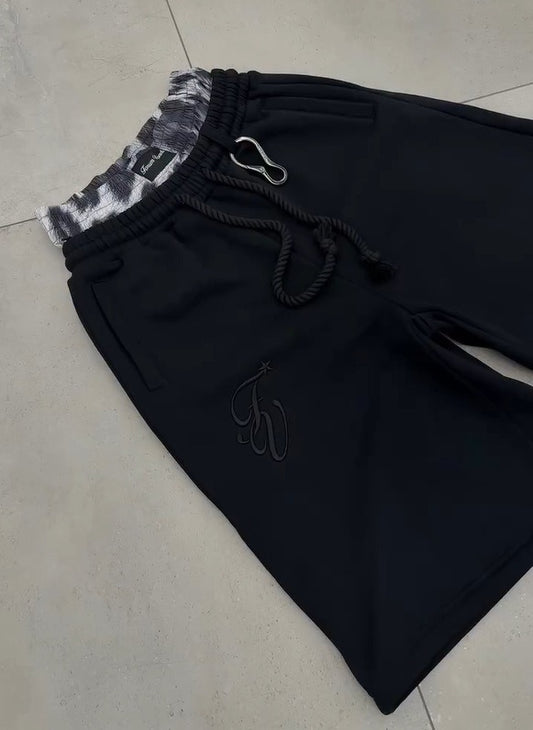 Kina - Double Waisted Camo Shorts