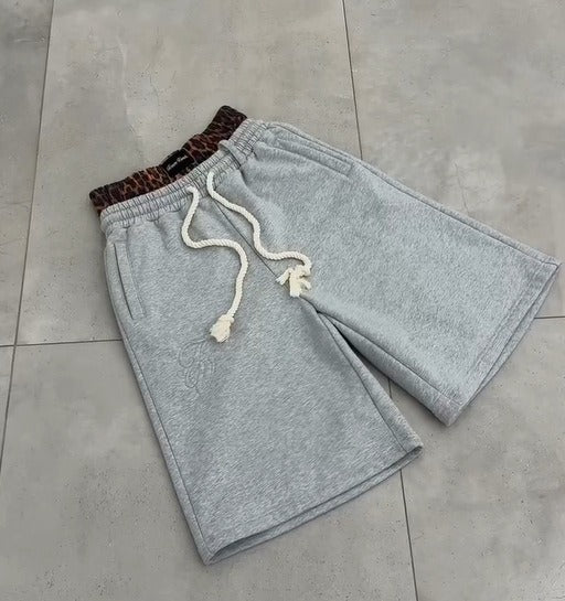 Kina - Double Waisted Camo Shorts