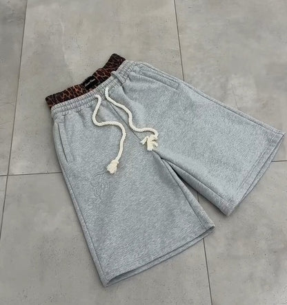 Kina - Double Waisted Camo Shorts