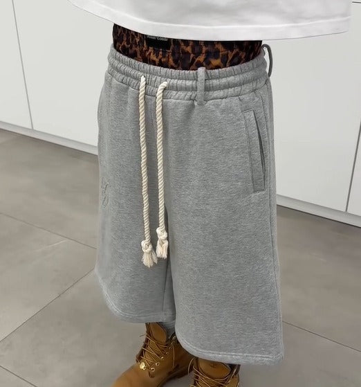 Kina - Double Waisted Camo Shorts